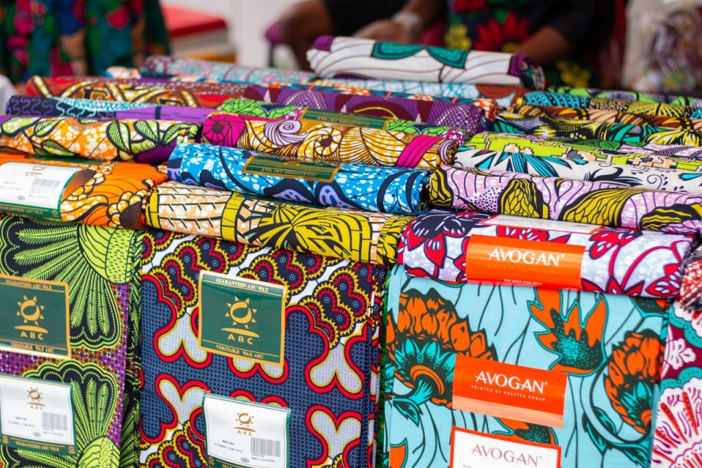 Vibrant and colorful African fabrics on display, showcasing intricate patterns and designs.
